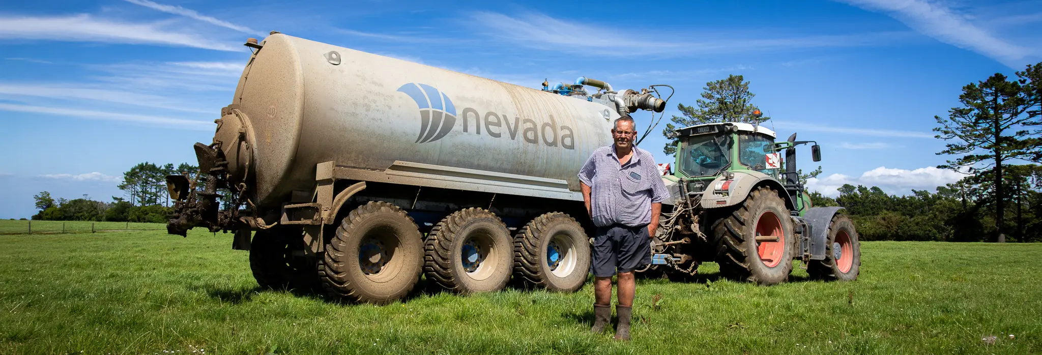 Ross Clark standing in front of his Nevada Slurry Tanker in Taranaki NZ