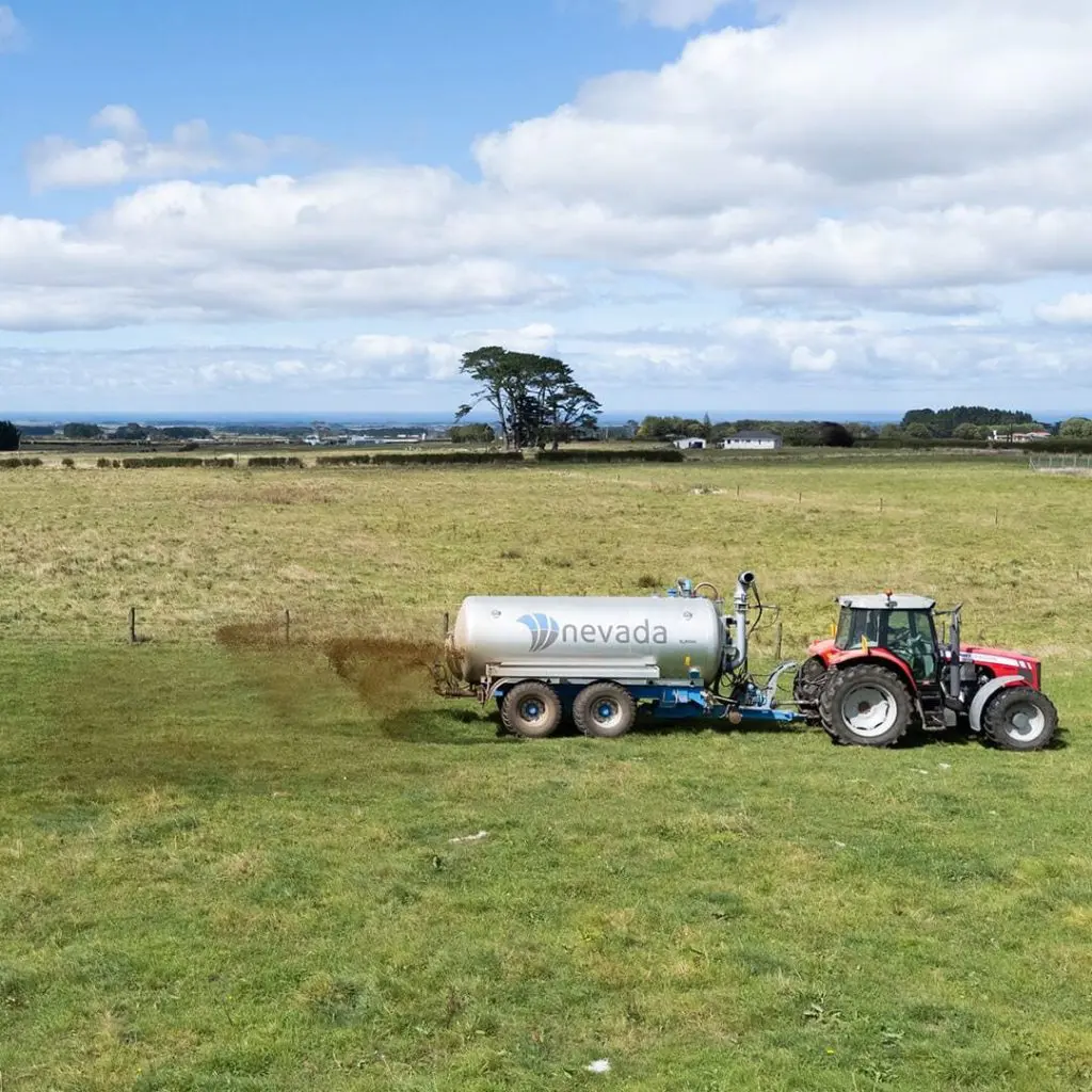 Is my Tractor too Small for a Slurry Tanker? 1 Nevada 10,000L Tandem Slurry Tanker spreading effluent with a RainWave applicator being pulled with a red tractor