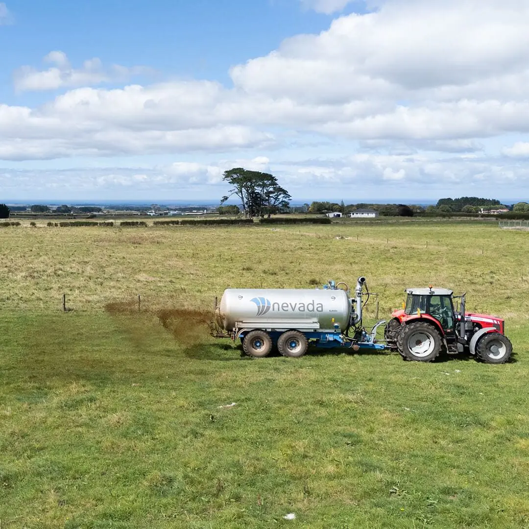 The Ultimate Guide to Slurry Tankers 7 Nevada 10,000L Tandem Slurry Tanker spreading effluent with a RainWave applicator