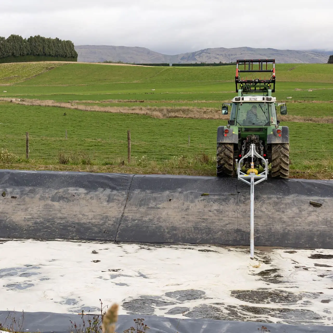 Nevada PTO stirrer in action swirling up an effluent pond
