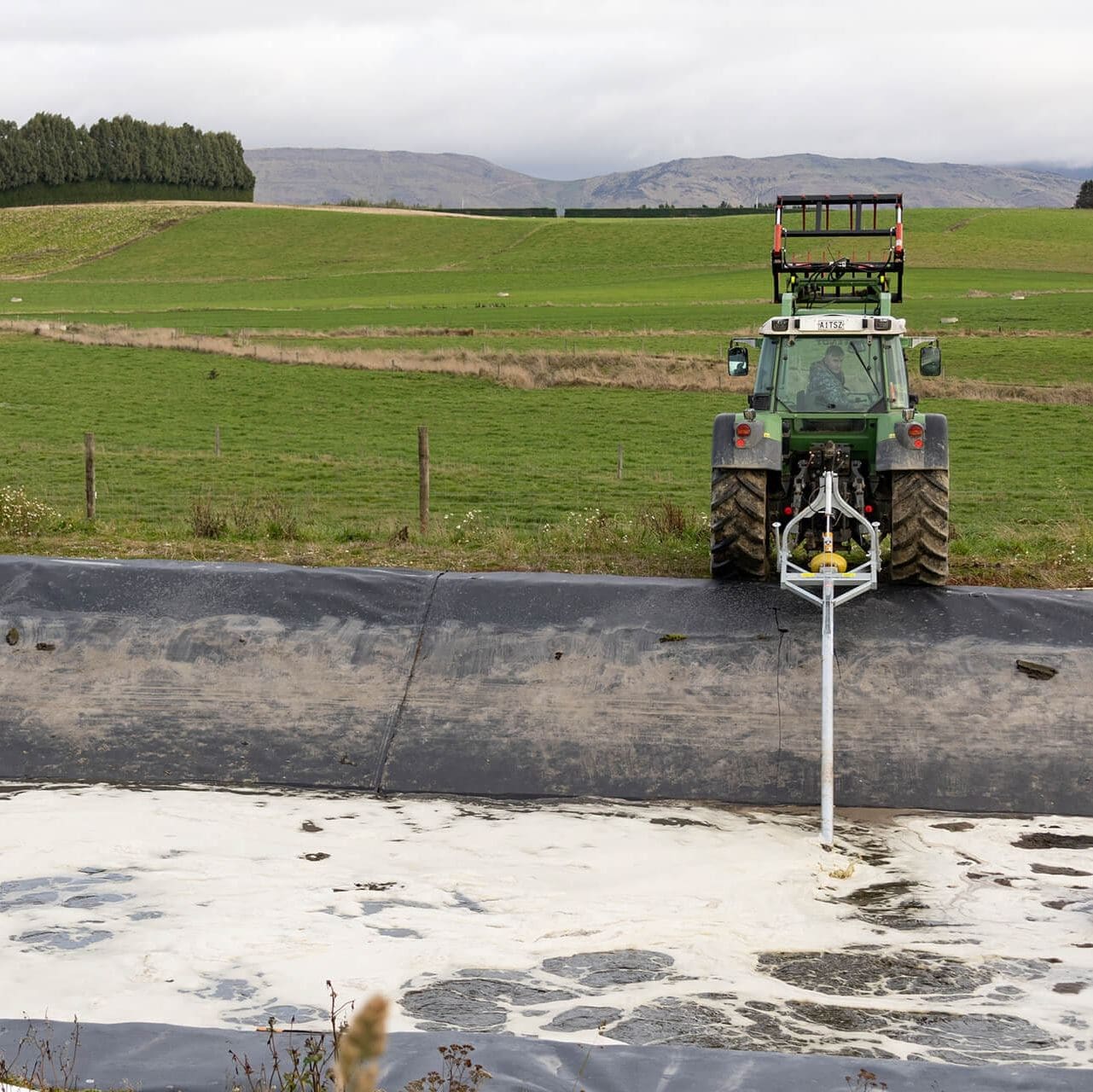 Nevada PTO stirrer in action swirling up an effluent pond